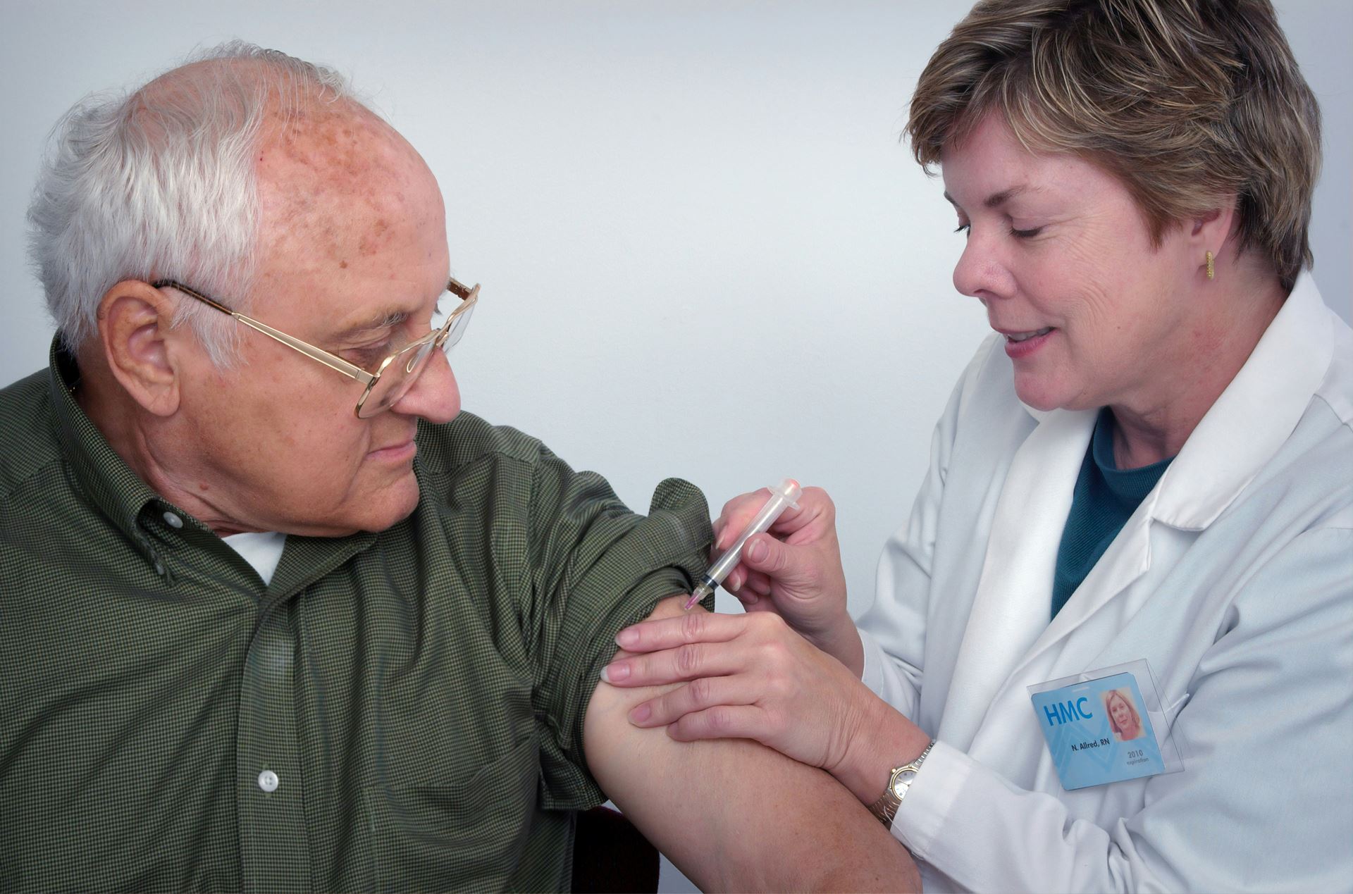 Nurse helping older man